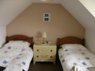 One of the twin bedrooms
